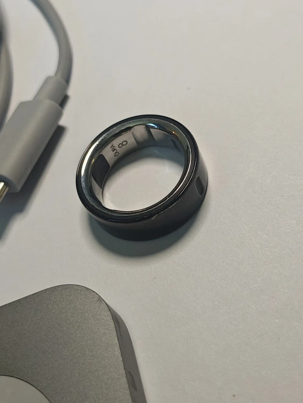 Oura Ring 4 in Black with Silver Interior (Size 8)